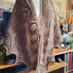 Aston shawl draped across a torso mannequin