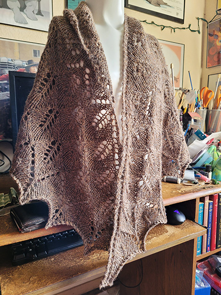Aston shawl draped across a torso mannequin