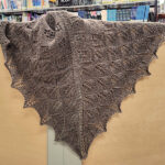 Aston shawl on a library interior wall.